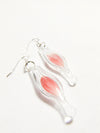 Glass capsule earrings with pastel pink feathers